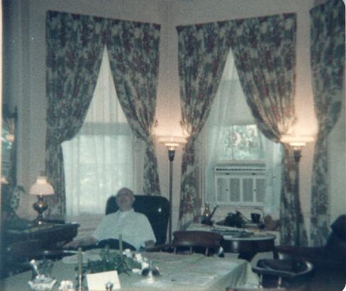 Mr Claude Wright Blanchard in the octagon wing informal dining room in his Charleston Plantation, Fenwick Hall, on John's Island, SC 